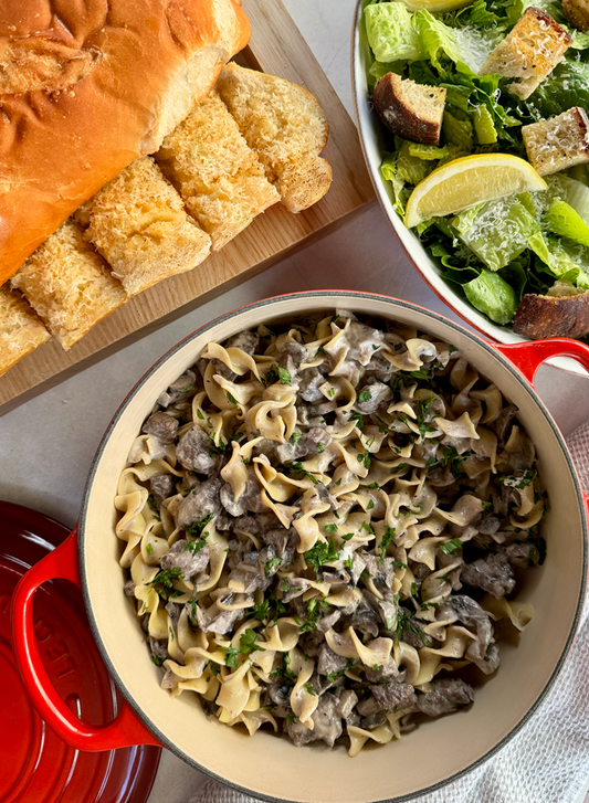 NEW Beef Stroganoff served with Egg Noodles, Garlic Bread, and your choice of salad