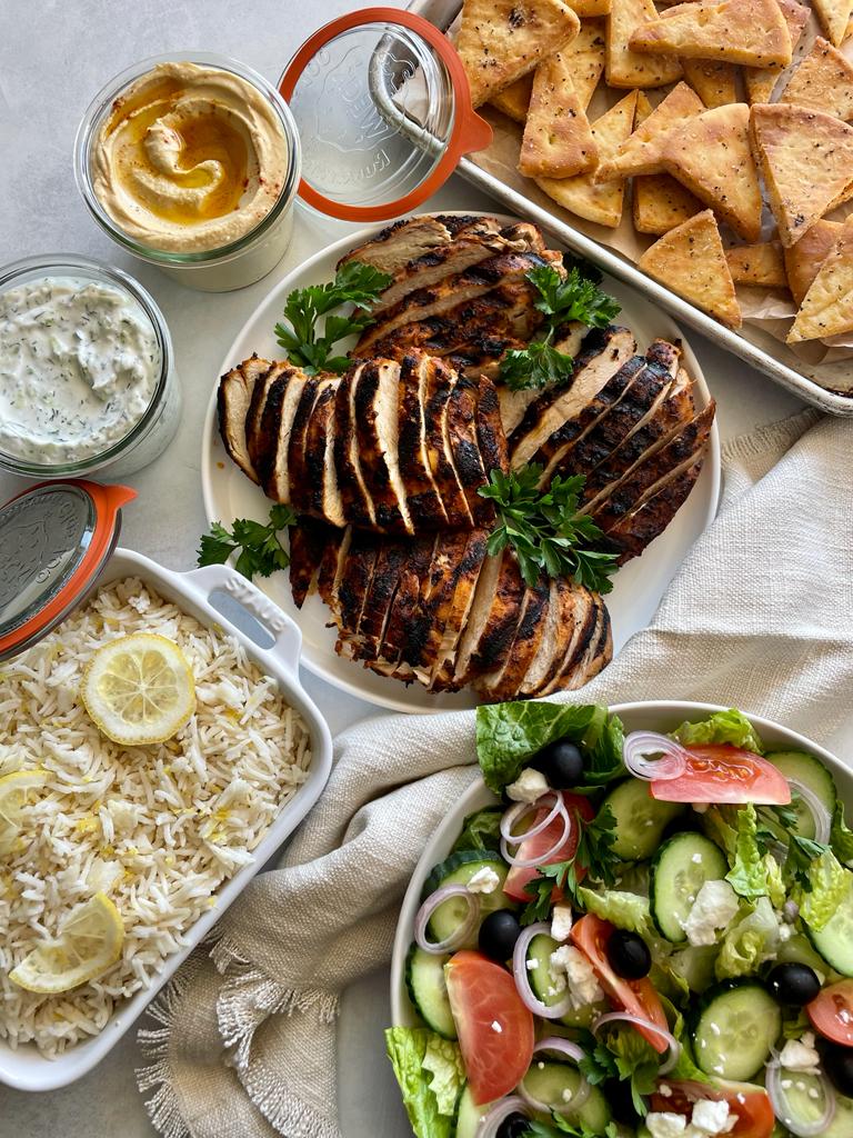 Grilled Chicken Shawarma, Greek Salad, Rice Pilaf, Toasted Pita, Handmade Hummus and Tzatziki