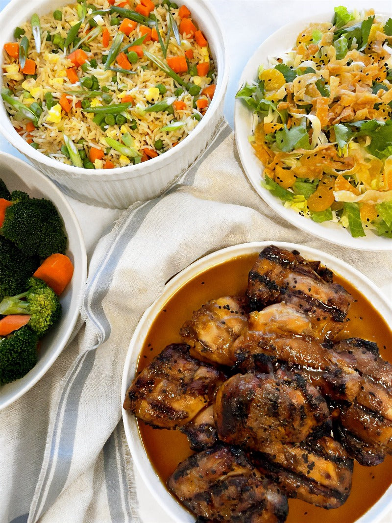 Grilled Teriyaki Chicken, Fried Rice, Sesame Mandarin Salad, Steamed Broccoli and Carrots